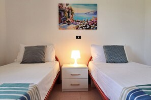 2 عدّة غرف نوم ومكواة/لوح كي وواي فاي مجانًا وملاءات أسرّة