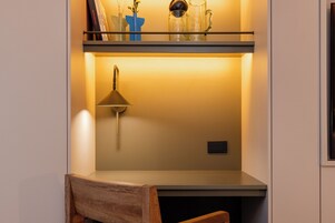 Design Studio Suite | In-room safe, desk, laptop workspace, blackout drapes