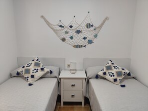2 bedrooms, iron/ironing board, WiFi, bed sheets