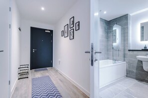 Apartment, City View | Living area | Flat-screen TV