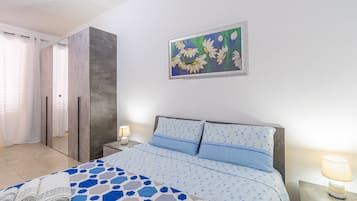 2 habitaciones, tabla de planchar con plancha, wifi y ropa de cama