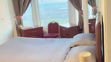Desk, laptop workspace, free WiFi, bed sheets