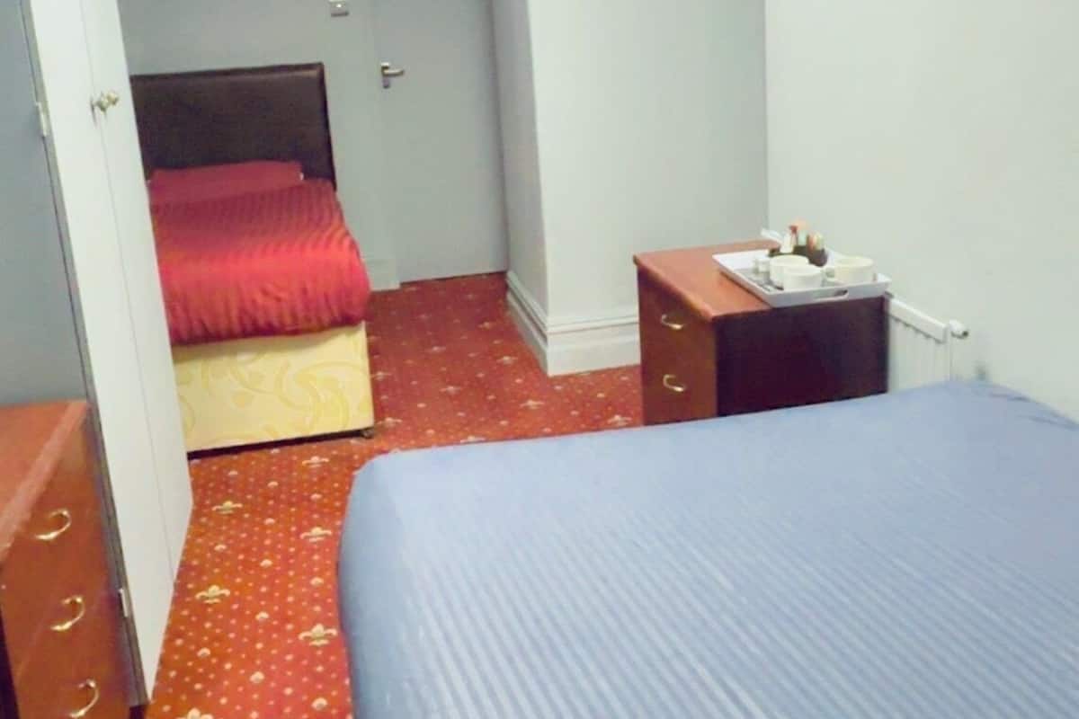 Desk, laptop workspace, free WiFi, bed sheets