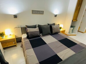 2 dormitorios, tabla de planchar con plancha, Internet y ropa de cama