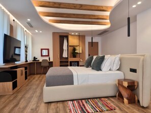 Suíte superluxo, vista para a cidade | Escrivaninha, Wi-Fi de cortesia