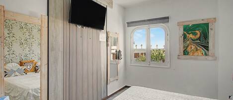 2 habitaciones, tabla de planchar con plancha, wifi y ropa de cama