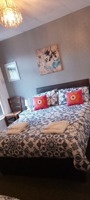 Deluxe vierpersoonskamer, uitzicht op de binnenplaats | Gratis wifi