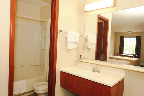 Hair dryer, towels, soap, shampoo