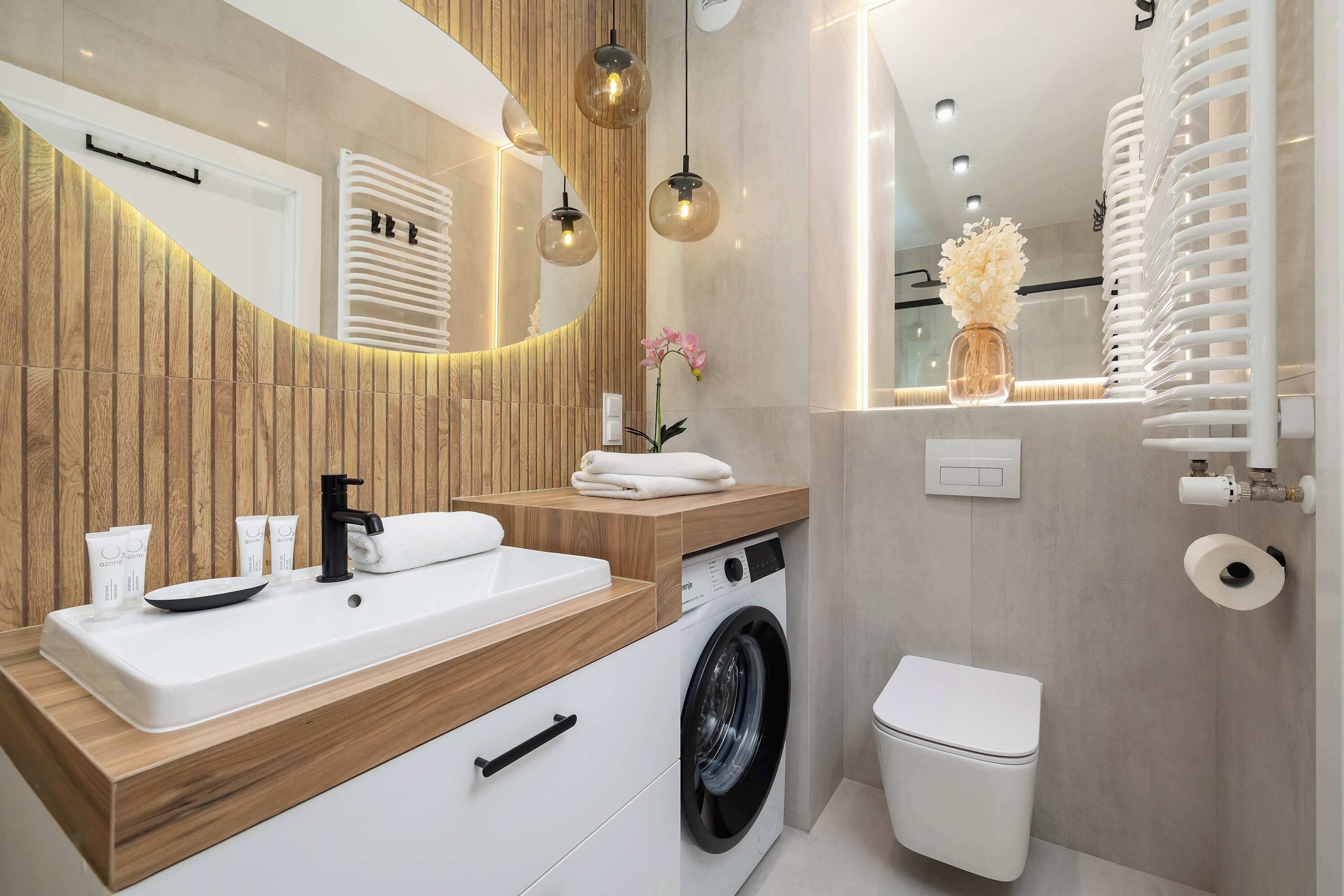 Shower, hair dryer, towels, shampoo