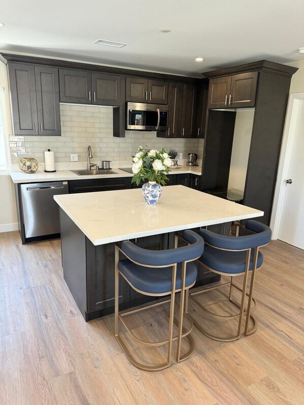 Microwave, stovetop, dishwasher, paper towels