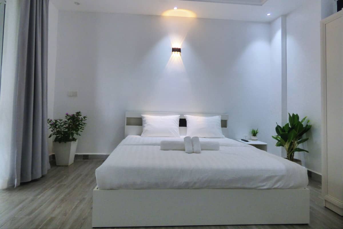 Doppia Superior, patio, vista giardino | Una scrivania, postazione laptop, Wi-Fi gratuito