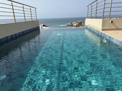 Luxury apartment with rooftop, games room, 5 min from the beach