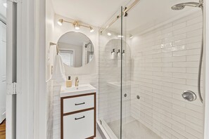 Hair dryer, towels, soap, shampoo