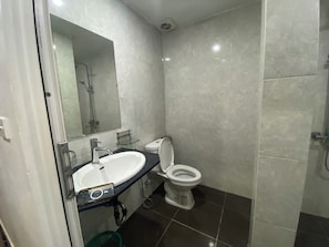 Shower, slippers, towels, soap