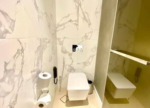 Hair dryer, towels, soap, toilet paper