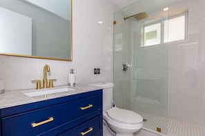 Hair dryer, towels, soap, toilet paper