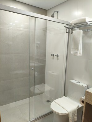 Superior Suite | Bathroom | Shower, hair dryer, towels, soap