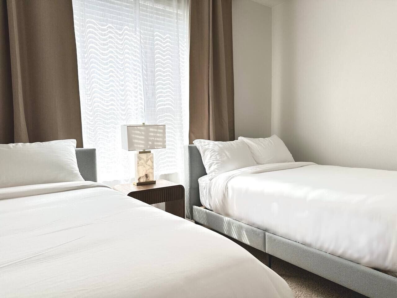 2 bedrooms, desk, iron/ironing board, travel crib