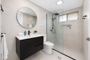 Shower, hair dryer, towels, soap