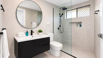 Shower, hair dryer, towels, soap