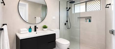 Shower, hair dryer, towels, soap