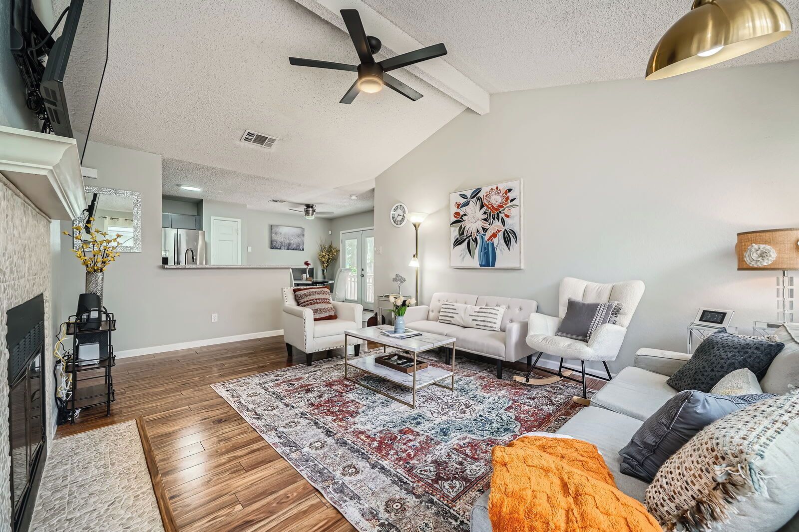 TV, fireplace, books, offices