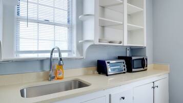 Fridge, microwave, coffee/tea maker, toaster