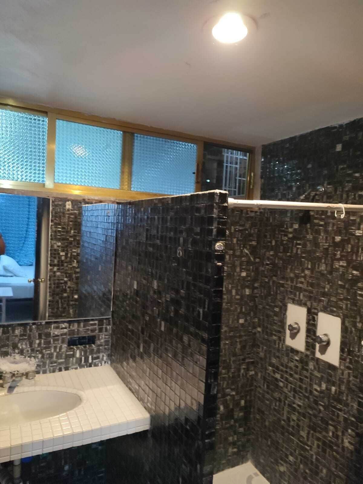 Shower, towels, soap, shampoo
