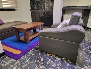 Living area - Deluxe Apartment Room #12 (Ikeja)