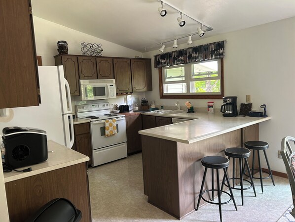 Fridge, microwave, oven, stovetop - 3-bedroom house located three miles from Sawyer Lake on the Michigamme River (Channing)