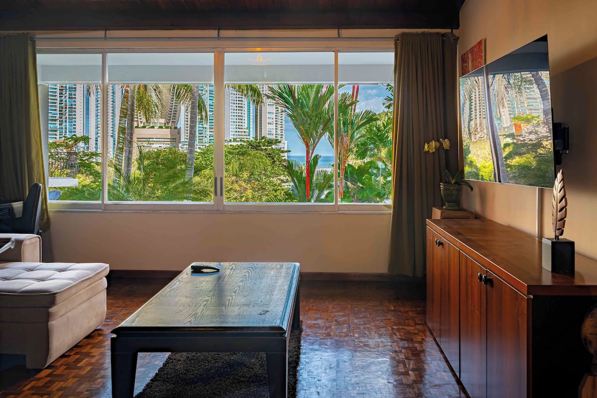Suite studio luxueuse, vue sur le jardin | Aire de séjour