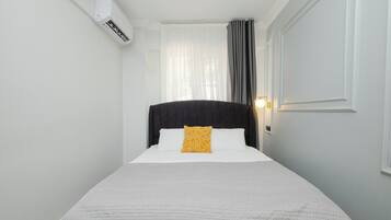 2 habitaciones, tabla de planchar con plancha, wifi y ropa de cama