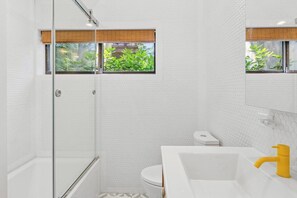 Shower, towels, soap, toilet paper