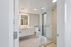 Shower, hair dryer, towels, soap