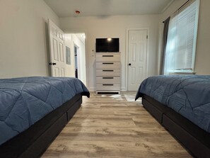 3 bedrooms, desk, iron/ironing board, travel cot