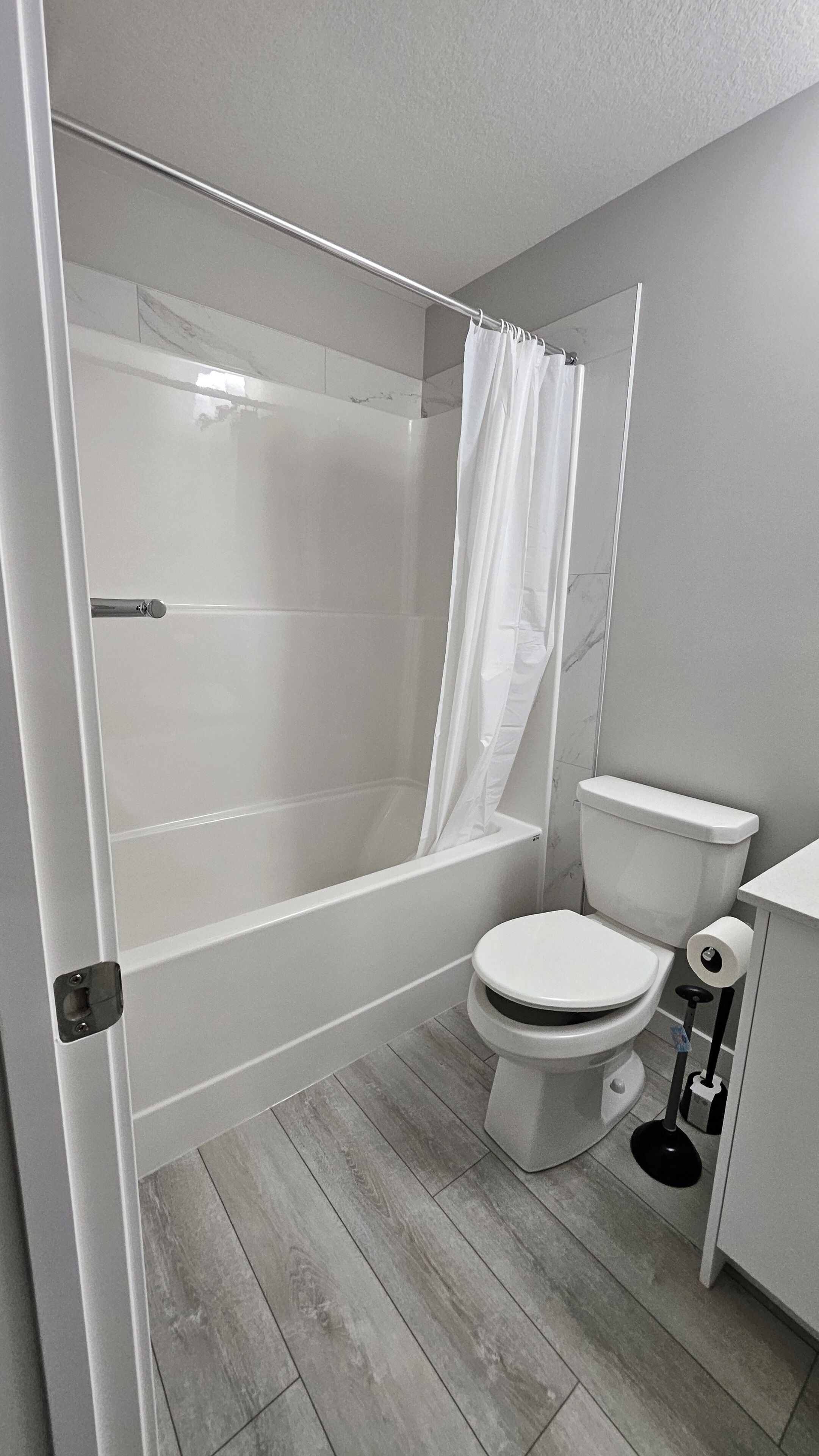 Hair dryer, towels, soap, toilet paper