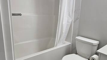 Hair dryer, towels, soap, toilet paper