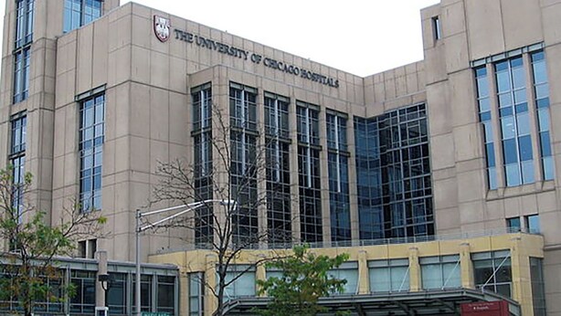 A building with the sign "The University of Chicago Hospitals" indicating a medical facility.