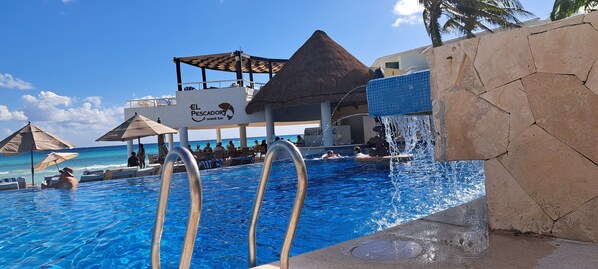 5 outdoor pools, pool umbrellas