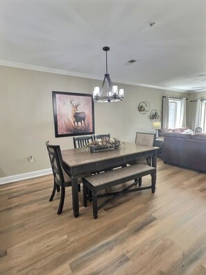 Dining table for six beside the open living area