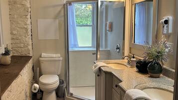 Jetted bath, hair dryer, towels, soap