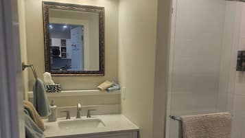 Shower, hair dryer, towels, soap