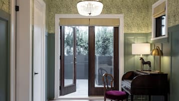 Deluxe Room, Garden View | Terrace/patio