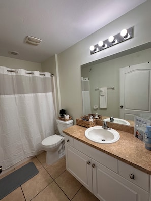 Hair dryer, towels, soap, toilet paper