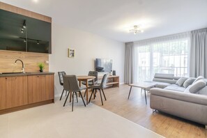 TV - Słoneczna Harmony Stay 37A Apartment (Katowice)