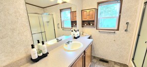 Hair dryer, towels, soap, shampoo