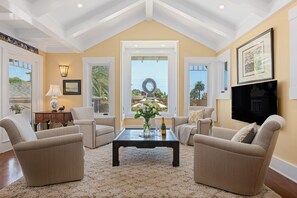 Smart TV, fireplace, books, printers