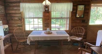 Welcoming to this cozy 3-bedroom cabin on 100 acres, in Tunbridge
