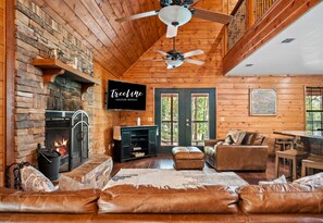 Smart TV, fireplace, DVD player, foosball