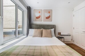 1 slaapkamer, een strijkplank/strijkijzer, wifi, beddengoed